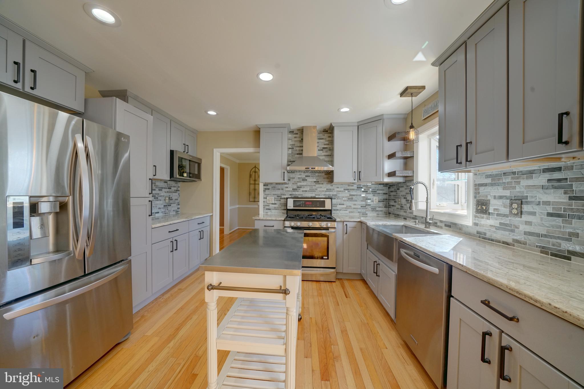 1900 Autumn Ridge Circle Silver Spring, MD 20906 - Photo 12 of 63 Quartz counter tops, farm style sink , and more