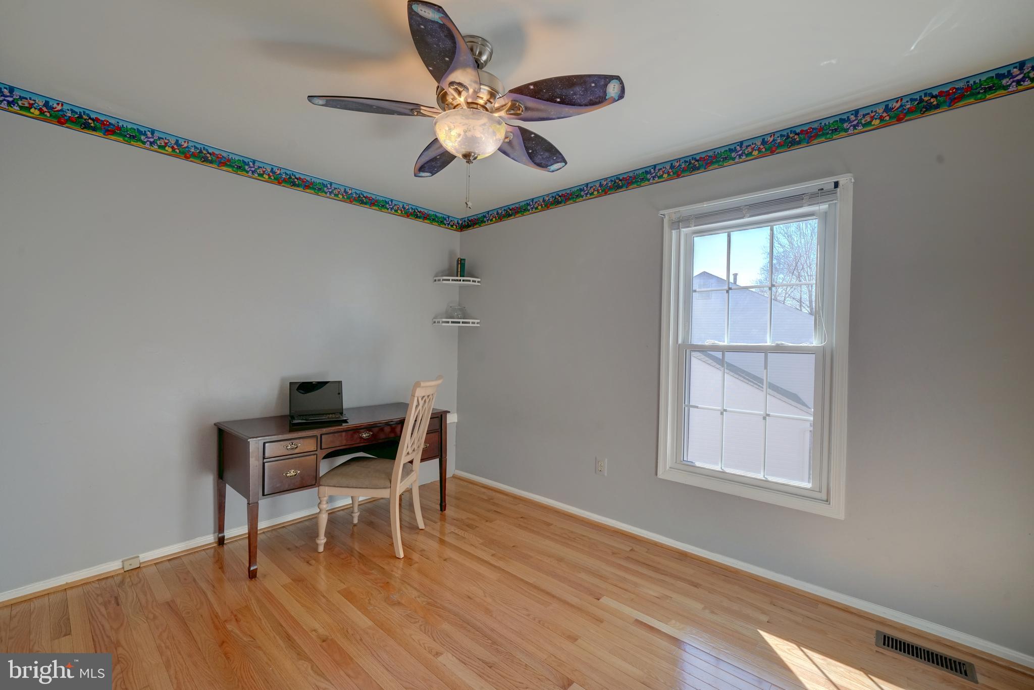 1900 Autumn Ridge Circle Silver Spring, MD 20906 - Photo 49 of 63 2nd bedroom with hardwoods and ceiling fan
