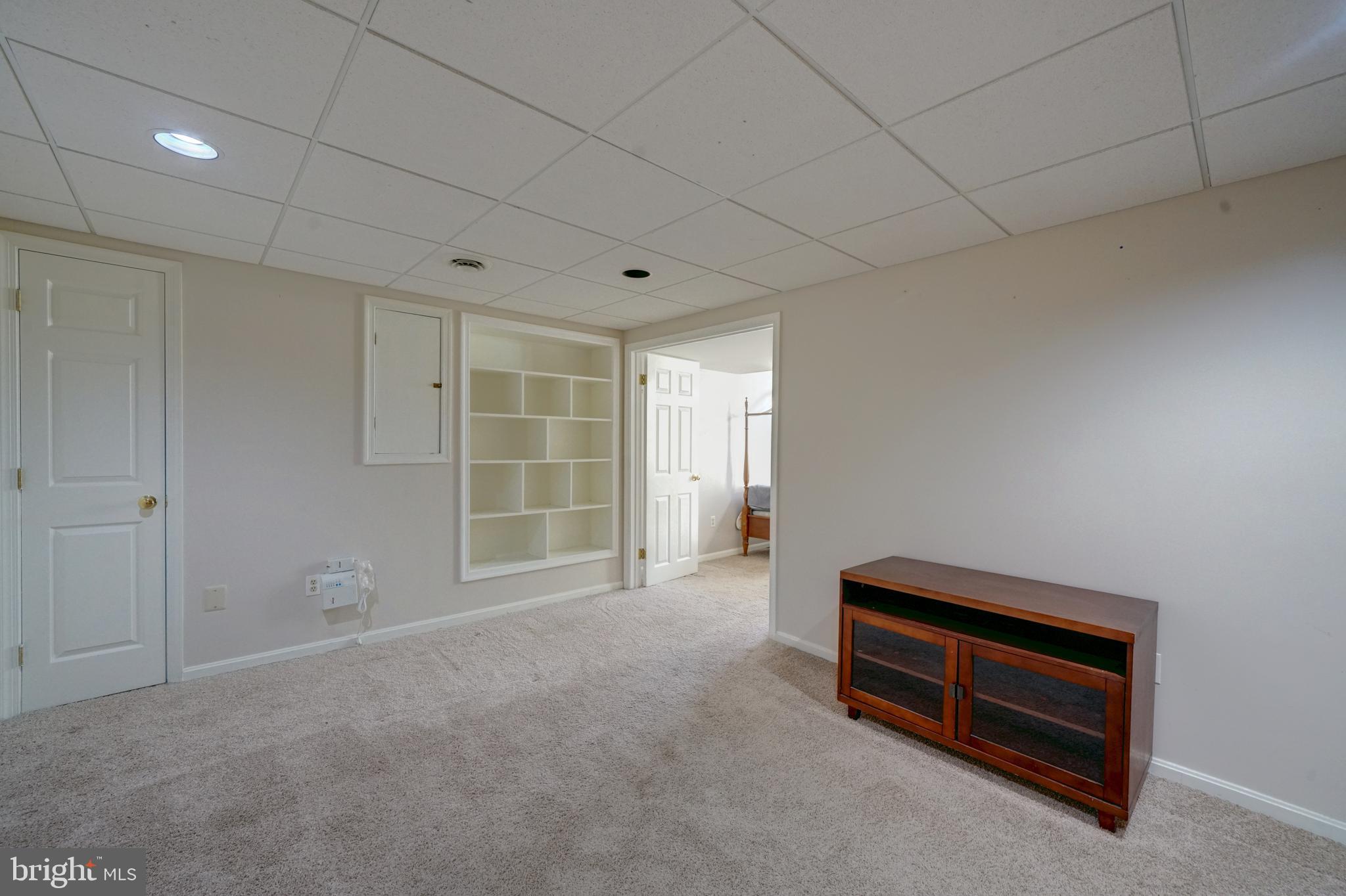 1900 Autumn Ridge Circle Silver Spring, MD 20906 - Photo 54 of 63 Bonus room in basement feature wall to wall carpet