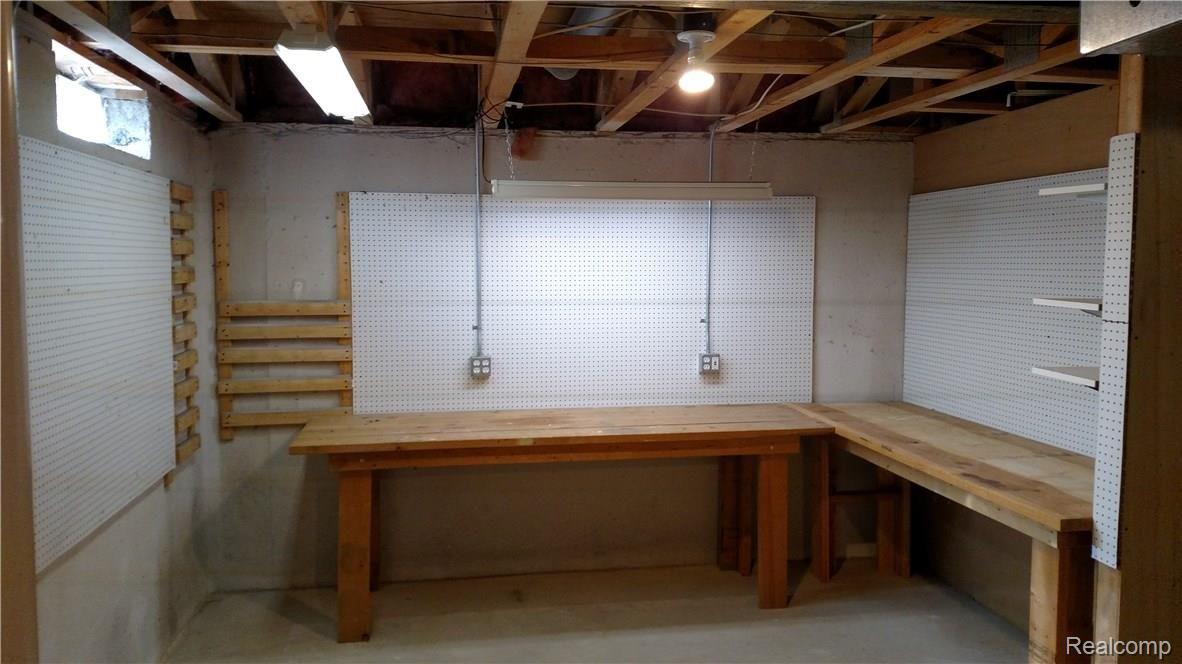 3124 Fairgrove Terrace, Unit 67 Rochester, MI 48309 - Photo 42 of 46 Basement workshop area