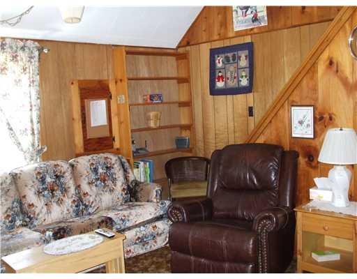 235 Quimby Pond Road Rangeley, ME 04970 - Photo 4 of 23 Living Room.