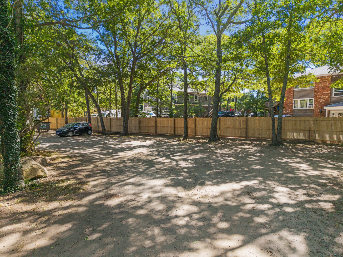 0 State Road Vineyard Haven, MA 02568 - Photo 7 of 7 a backyard of a house with large trees
