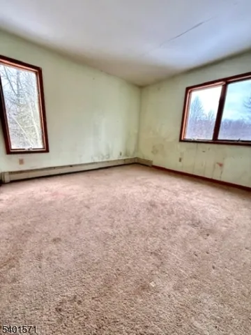 an empty room with window