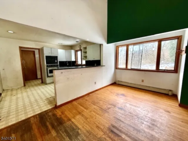 a view of a kitchen with a sink and a dishwasher
