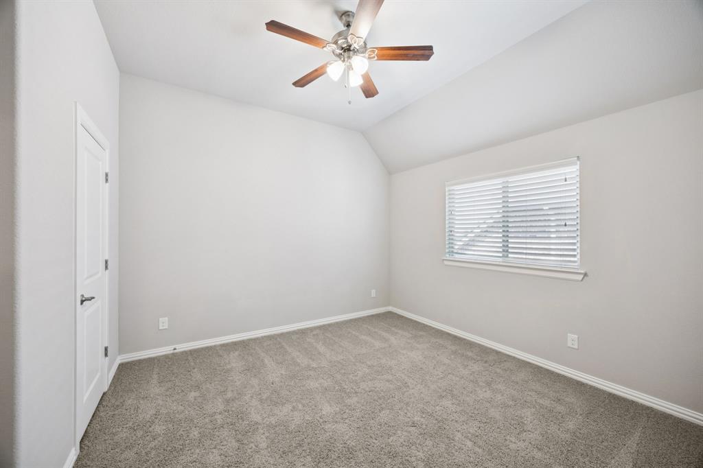 965 Touchstone Road Frisco, TX 75036 - Photo 24 of 36 an empty room with windows and fan