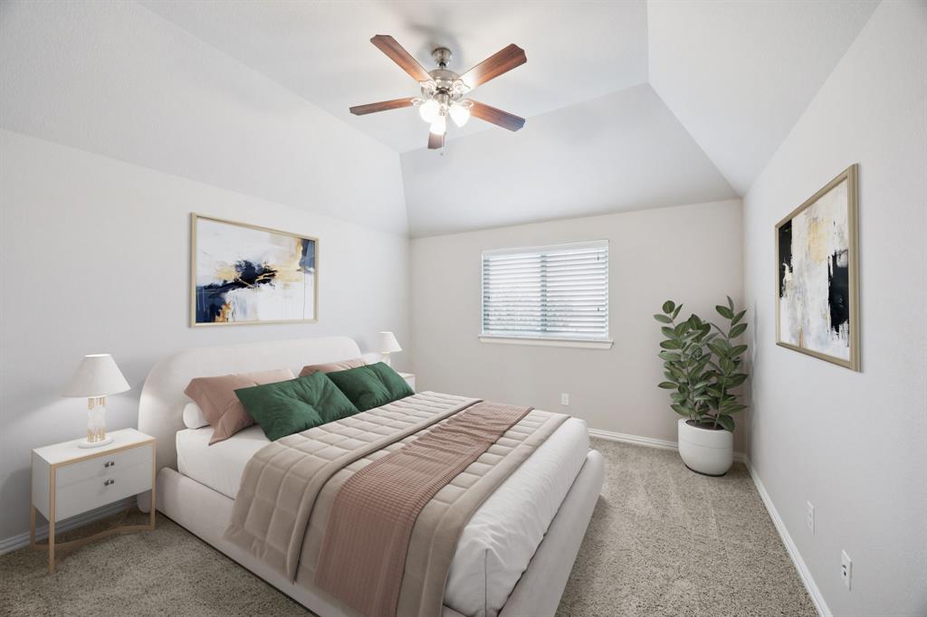 965 Touchstone Road Frisco, TX 75036 - Photo 28 of 36 a bedroom with a bed and a chandelier