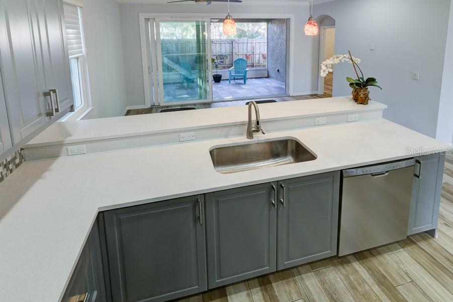 4436 Bliss Road Sarasota, FL 34233 - Photo 8 of 25 a kitchen with sink and window