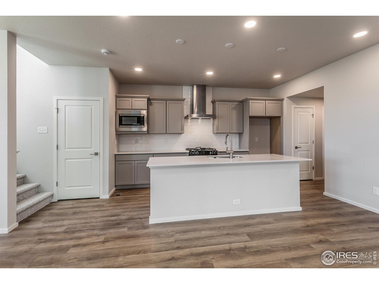 5409 Yancy Street Timnath, CO 80547 - Photo 1 of 48 KITCHEN W/ ISLAND