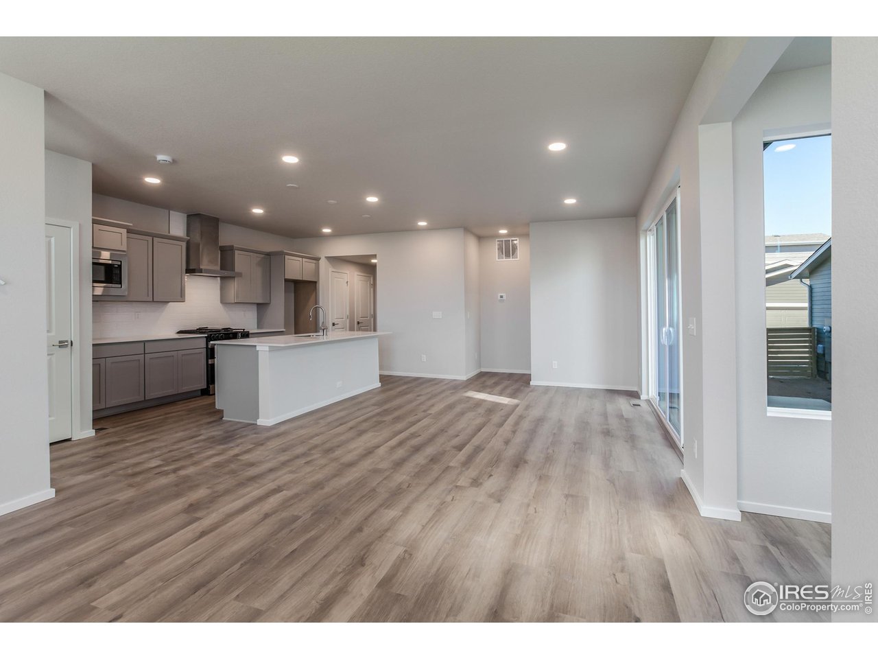 5409 Yancy Street Timnath, CO 80547 - Photo 5 of 48 LIVING, DINING AND KITCHEN