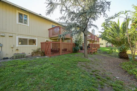 a view of a back yard of the house
