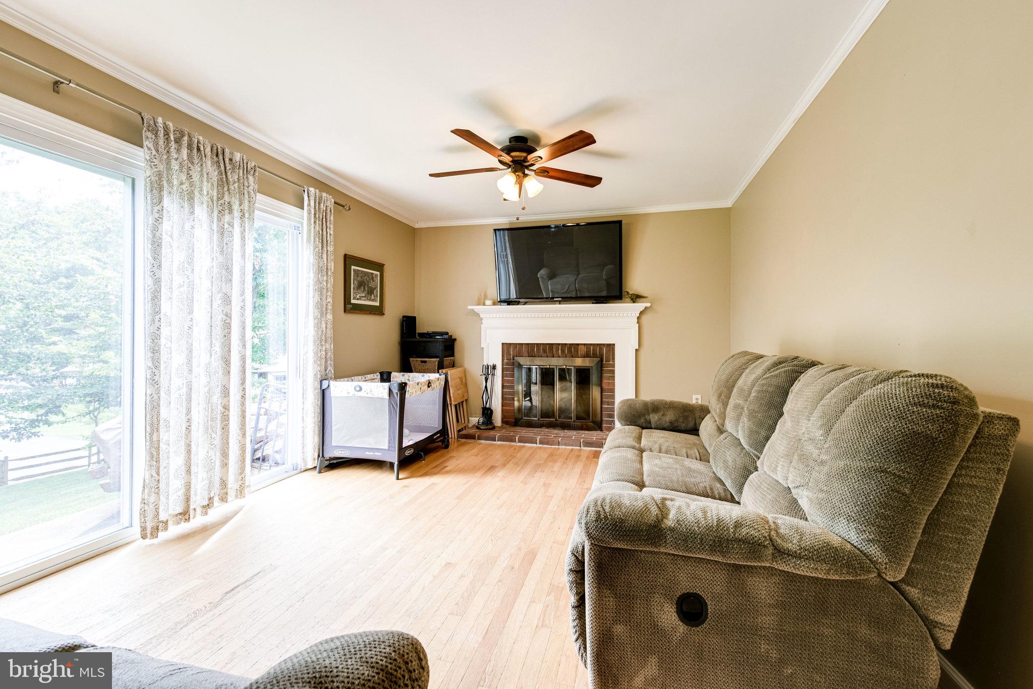 6905 Raspberry Plain Place Springfield, VA 22153 - Photo 32 of 66 Family Room opens to the backyard