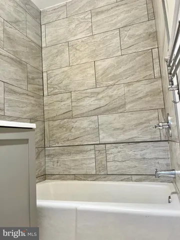 a bathroom with a bathtub