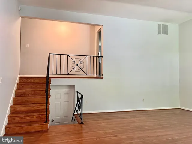 a view of entryway with wooden floor