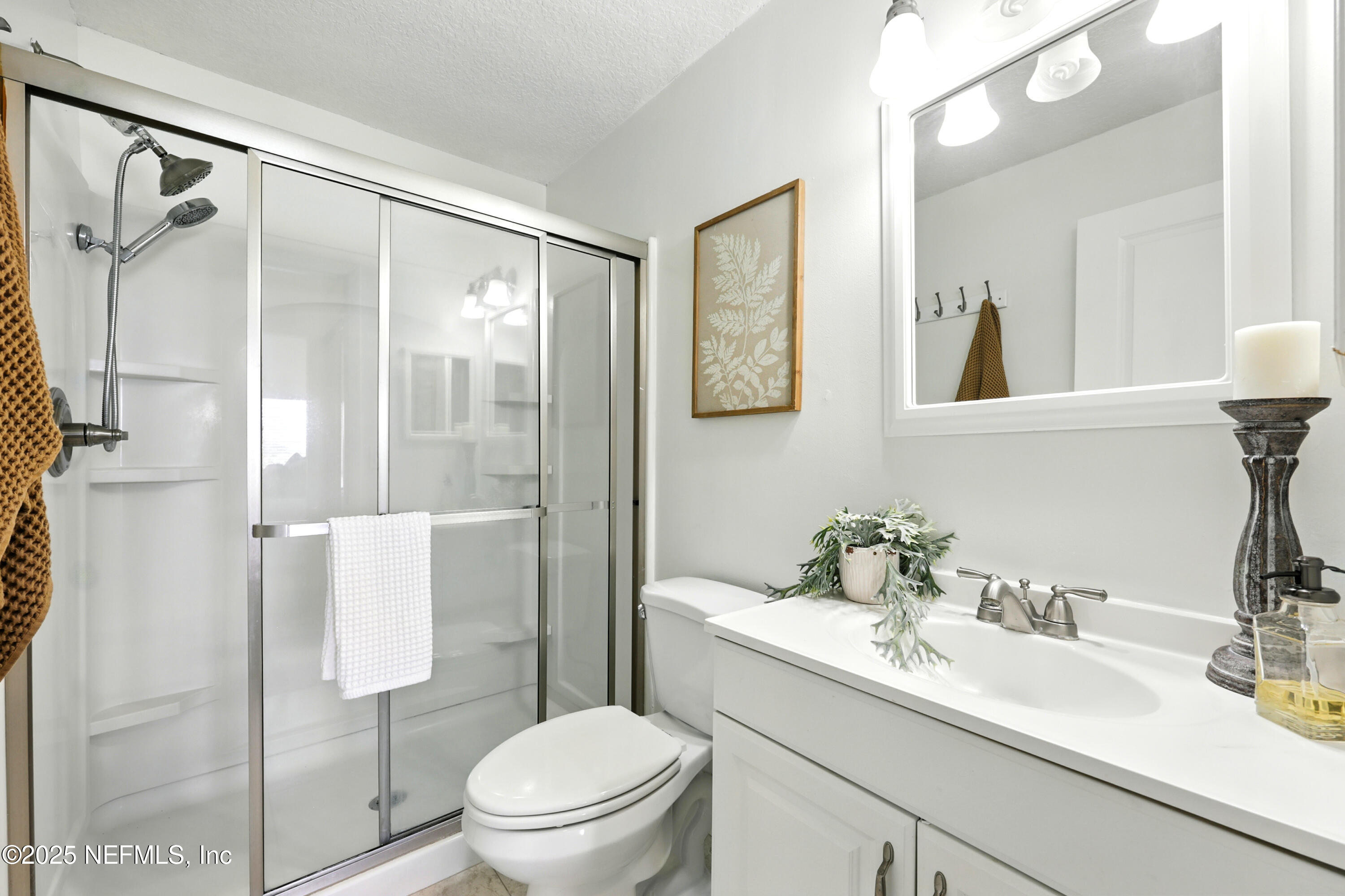 16 Cove Road Ponte Vedra Beach, FL 32082 - Photo 21 of 47 a bathroom with a sink toilet and shower