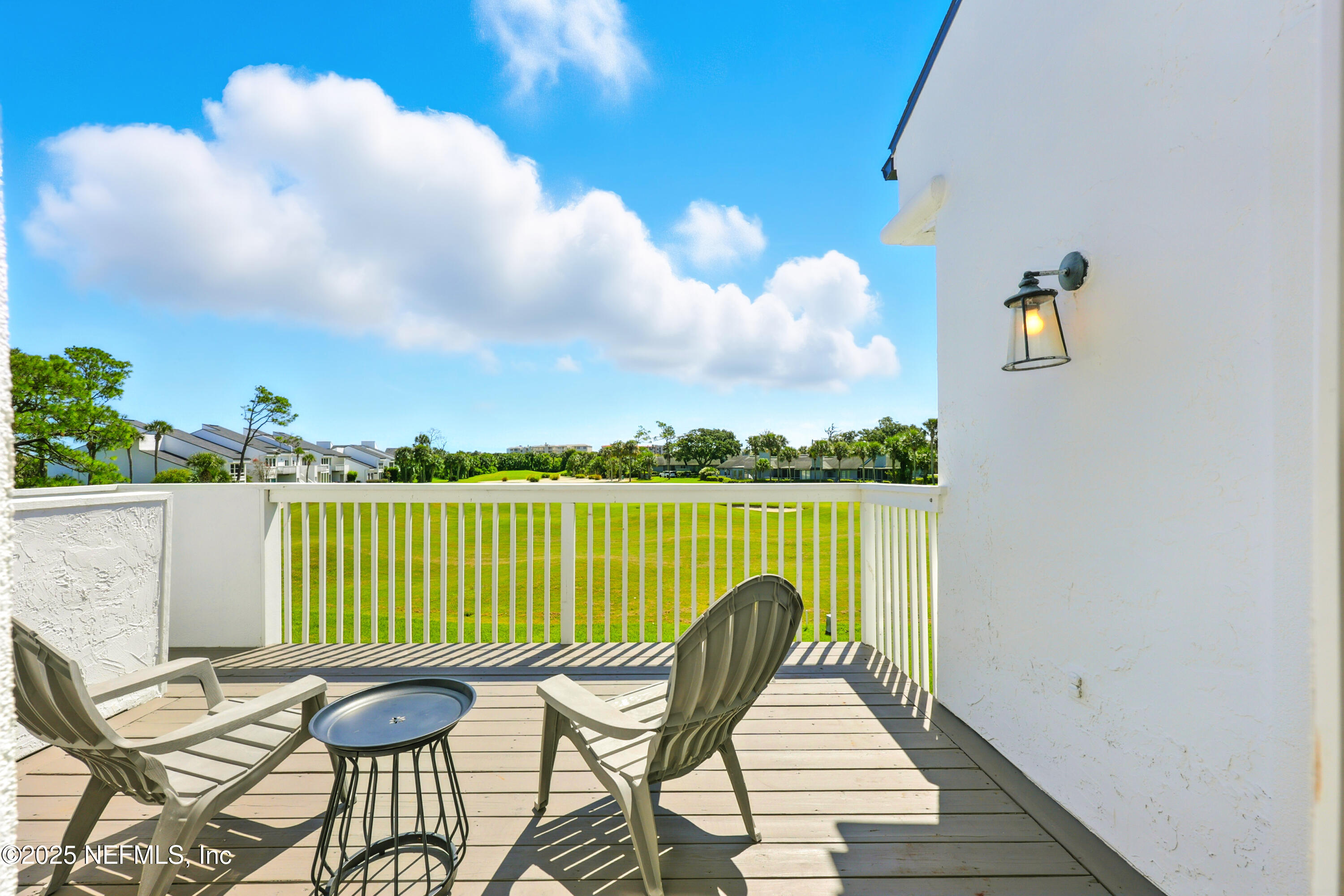 16 Cove Road Ponte Vedra Beach, FL 32082 - Photo 31 of 47 a view of a balcony with wooden floor