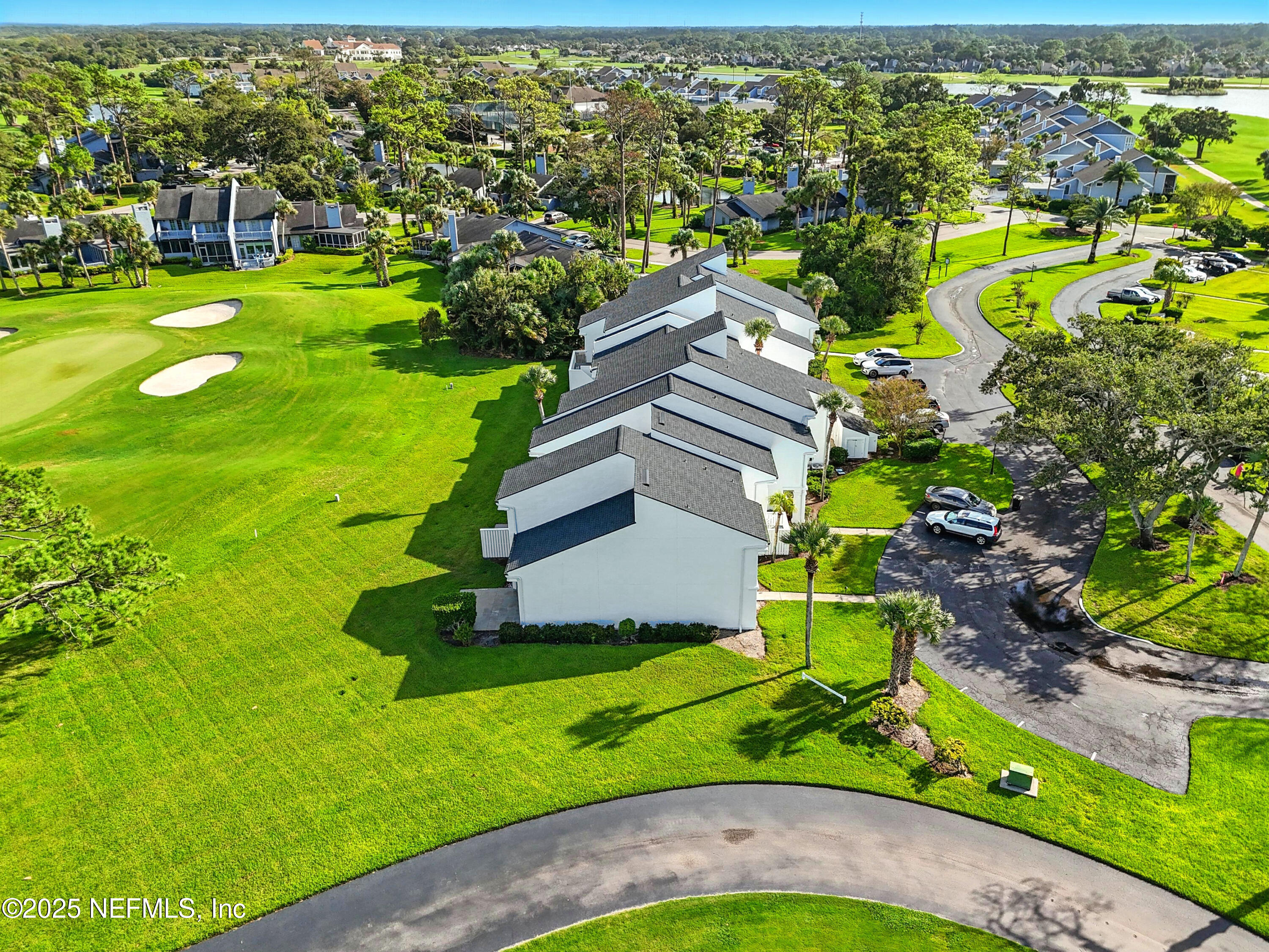 16 Cove Road Ponte Vedra Beach, FL 32082 - Photo 42 of 47 a view of a house with a garden