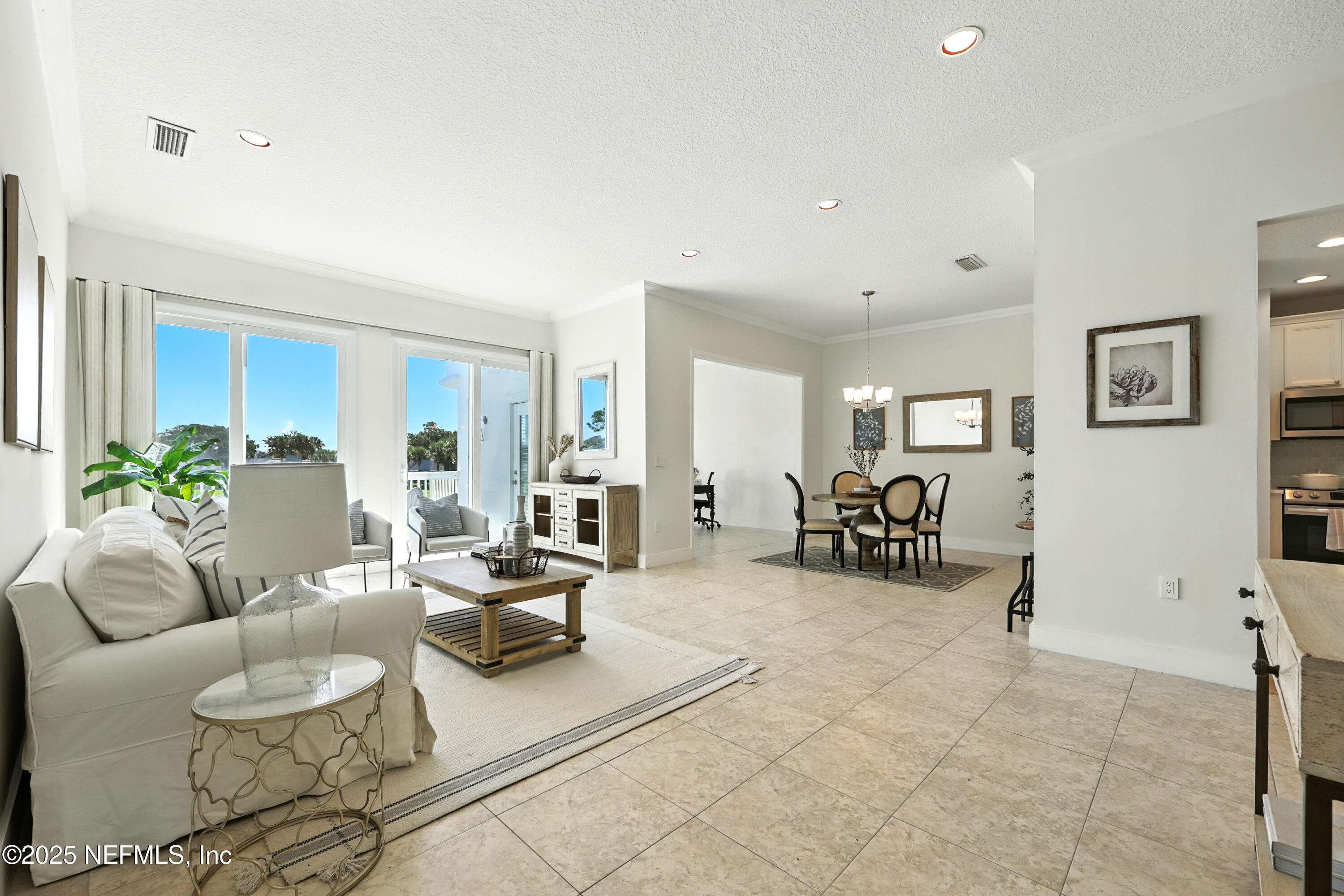 16 Cove Road Ponte Vedra Beach, FL 32082 - Photo 7 of 47 a living room with furniture and a table