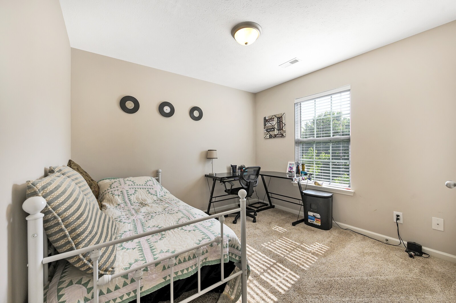 1129 Woodall Road Lebanon, TN 37090 - Photo 10 of 12 a bedroom with a bed and a window