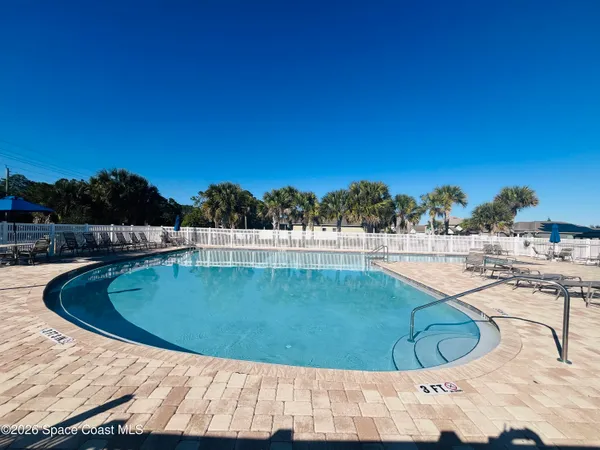 a view of outdoor space and swimming pool