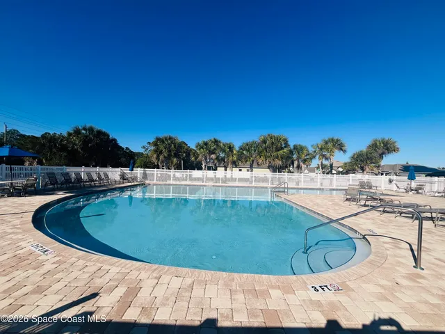 a view of outdoor space and swimming pool