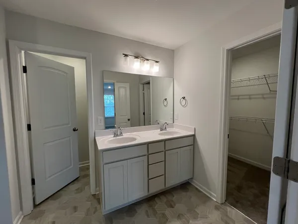 a view of storage and utility room with racks on the wall