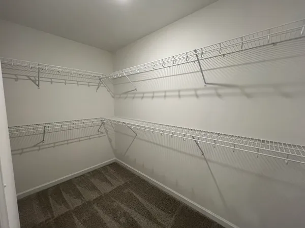 a view of a room with racks on the wall