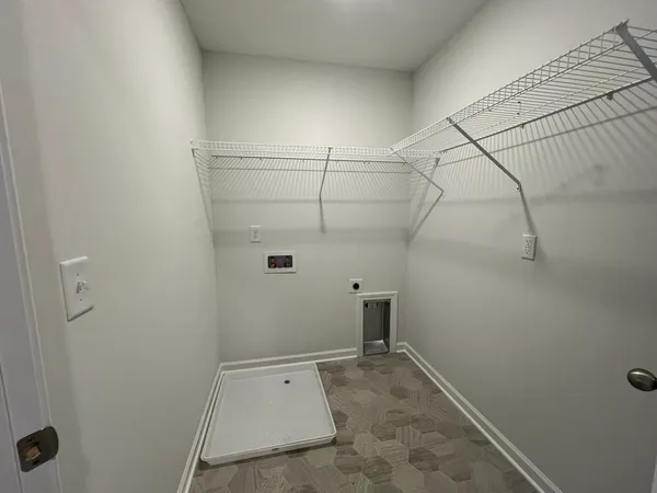 an empty room with a natural light