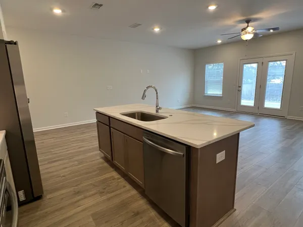 a bathroom with a sink and vanity