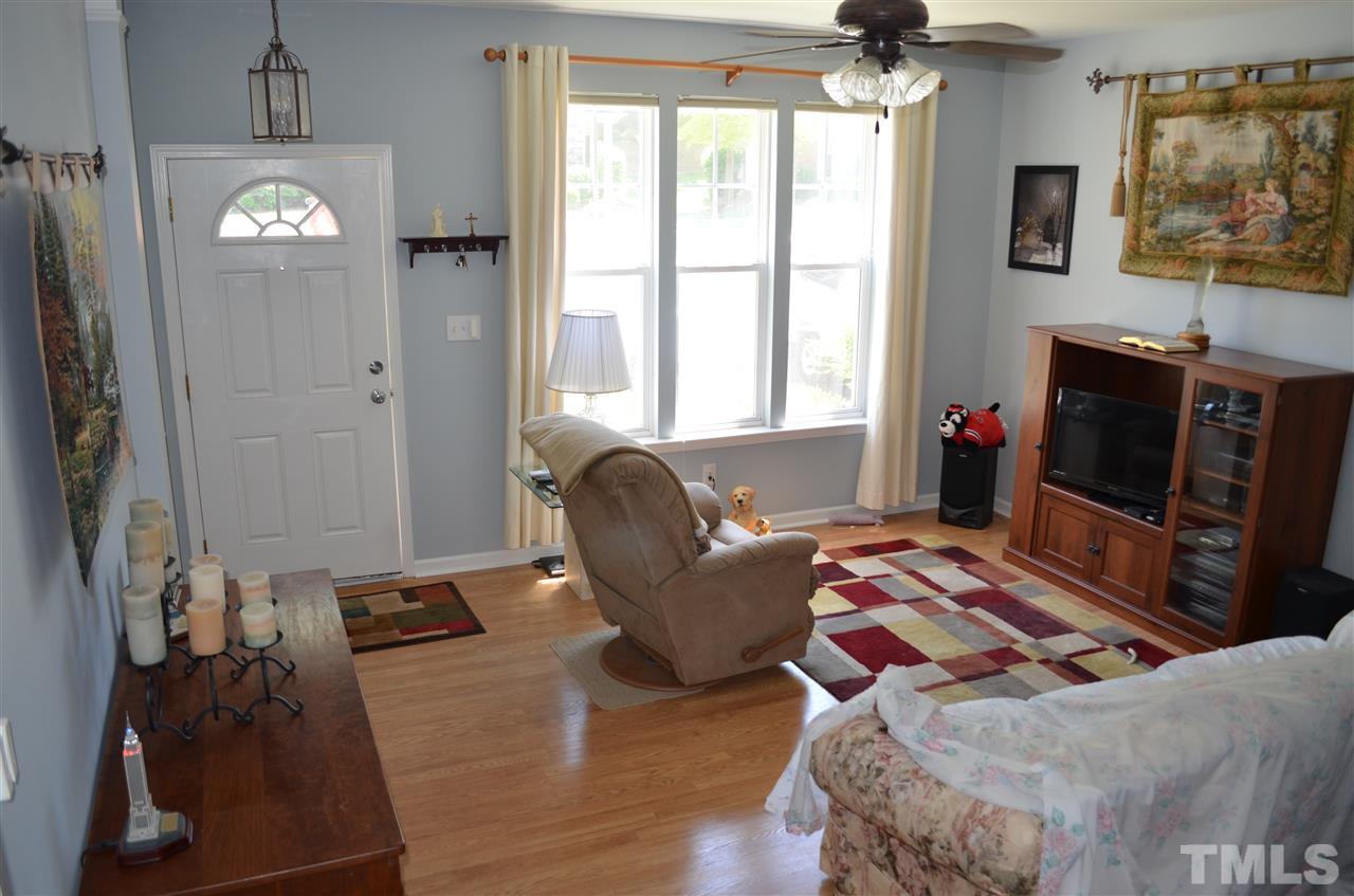 8480 Central Drive Raleigh, NC 27613 - Photo 2 of 19 Notice 3 Large Windows and Upgraded Light Fixture and Fan.