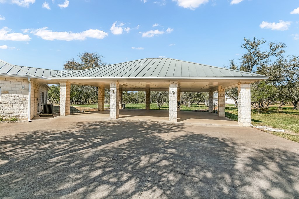 20400 Fm 2093 Harper, TX 78631 - Photo 31 of 39 a view of a house with a yard and porch