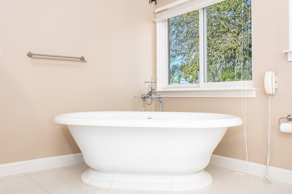 20400 Fm 2093 Harper, TX 78631 - Photo 7 of 39 a white bath tub sitting in a bathroom