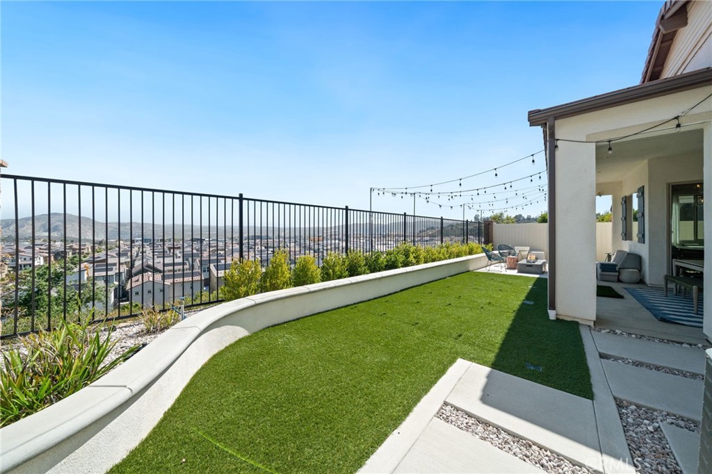 2308 Nova Way Corona, CA 92883 - Photo 24 of 32 a view of a balcony with a garden