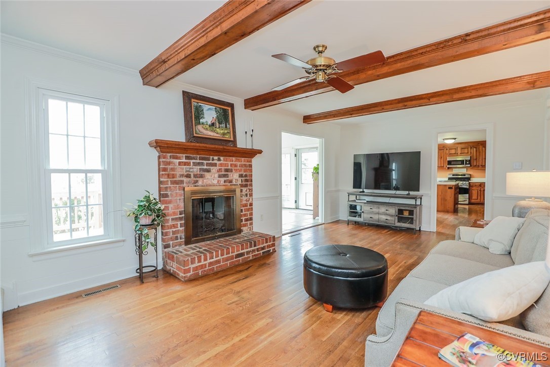 2400 Olde Stone Road Midlothian, VA 23113 - Photo 19 of 48 a living room with furniture and a fireplace
