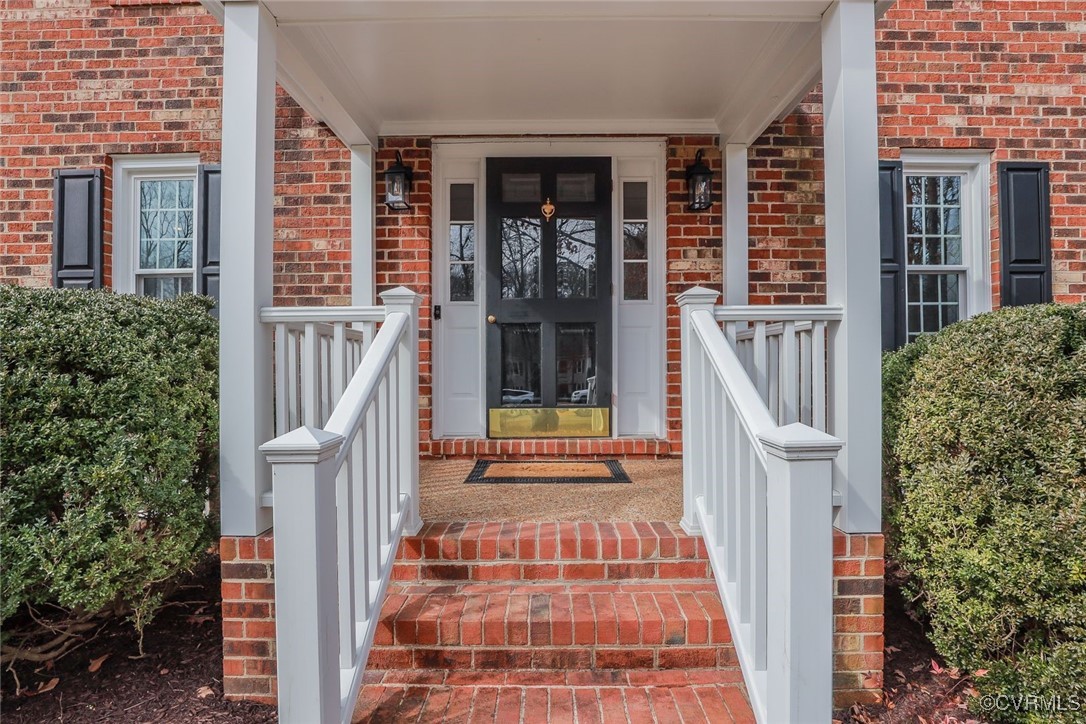 2400 Olde Stone Road Midlothian, VA 23113 - Photo 3 of 48 front view of a house with a porch