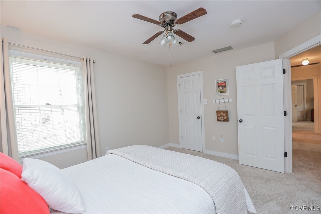 2400 Olde Stone Road Midlothian, VA 23113 - Photo 32 of 48 a bedroom with a bed and a window