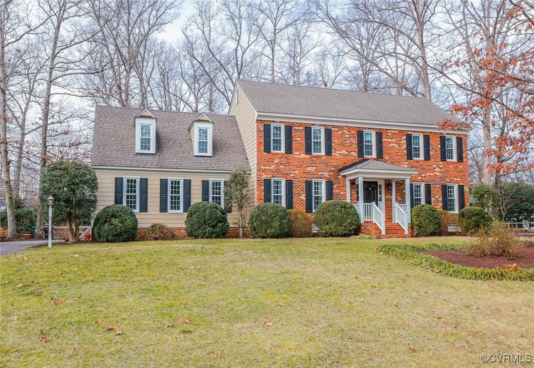 2400 Olde Stone Road Midlothian, VA 23113 - Photo 44 of 48 a front view of a building with garden