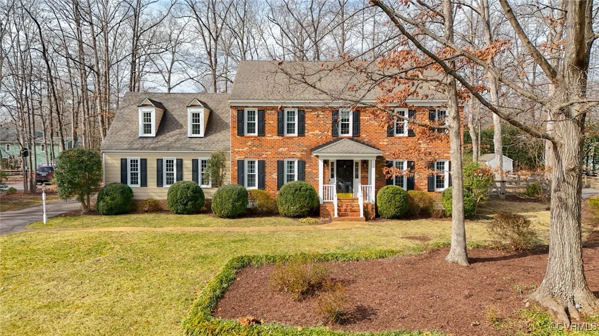 2400 Olde Stone Road Midlothian, VA 23113 - Photo 46 of 48 a front view of a house with a yard