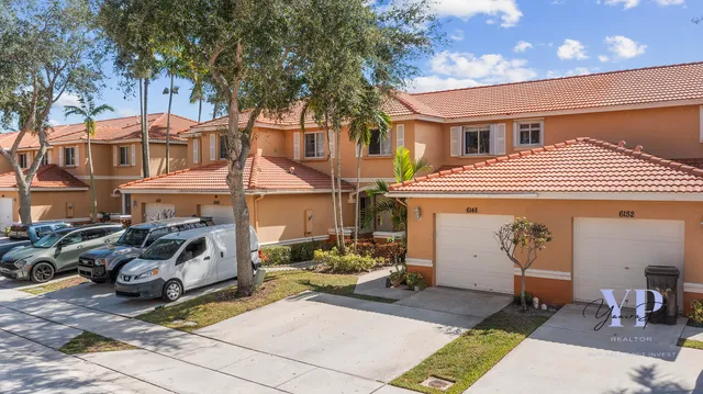 a view of a street with cars