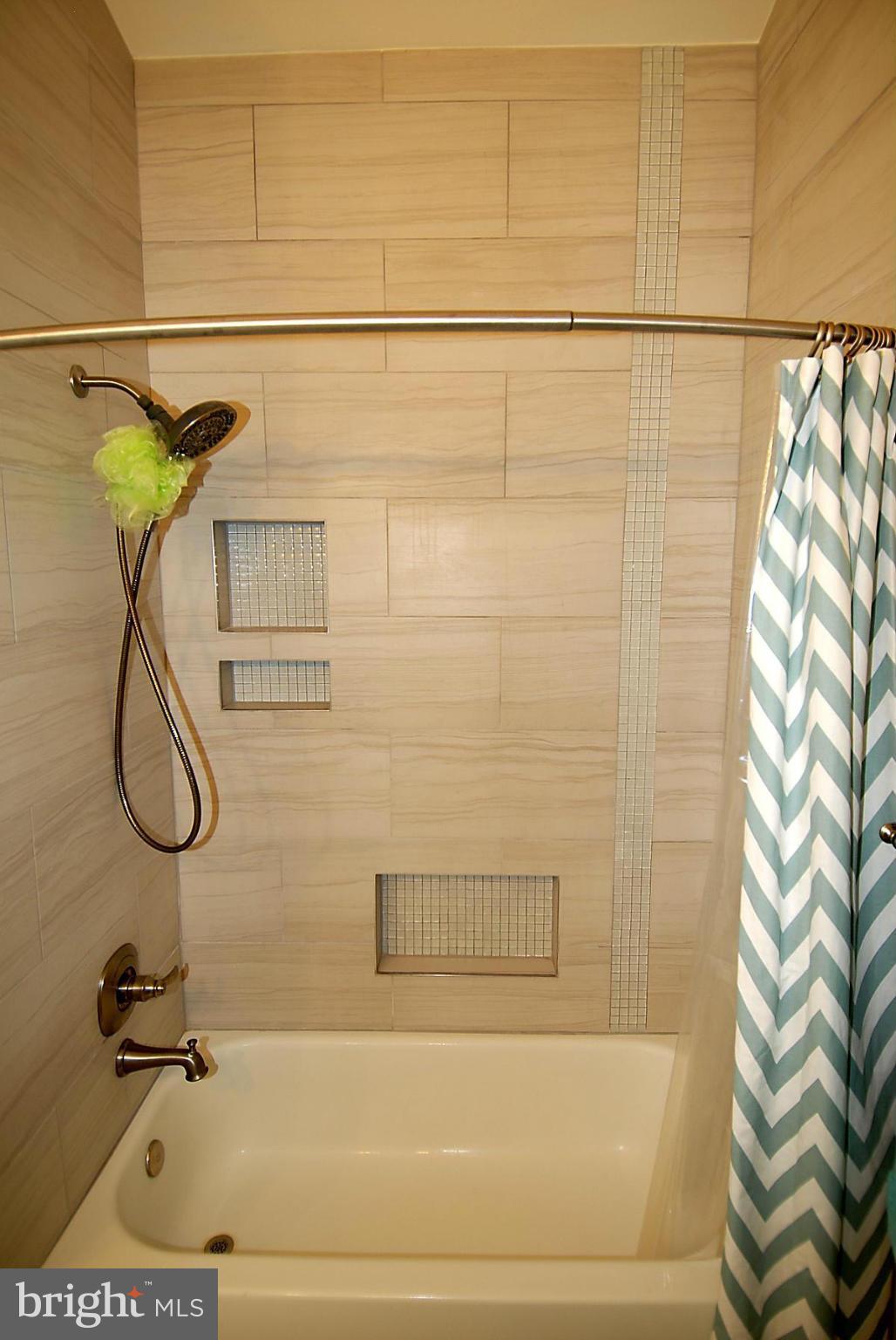 43233 Stillforest Terrace Ashburn, VA 20147 - Photo 19 of 30 a bathroom with a shower
