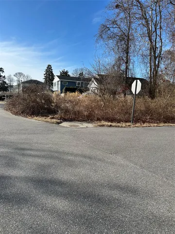 a view of a house with a street
