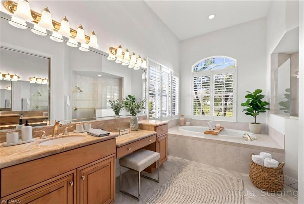 480 Terracina Way Naples, FL 34119 - Photo 14 of 40 Bathroom featuring a stall shower, a bath, vanity, and recessed lighting