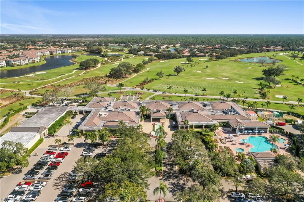 480 Terracina Way Naples, FL 34119 - Photo 38 of 40 Aerial perspective of suburban area with a large body of water and a golf course
