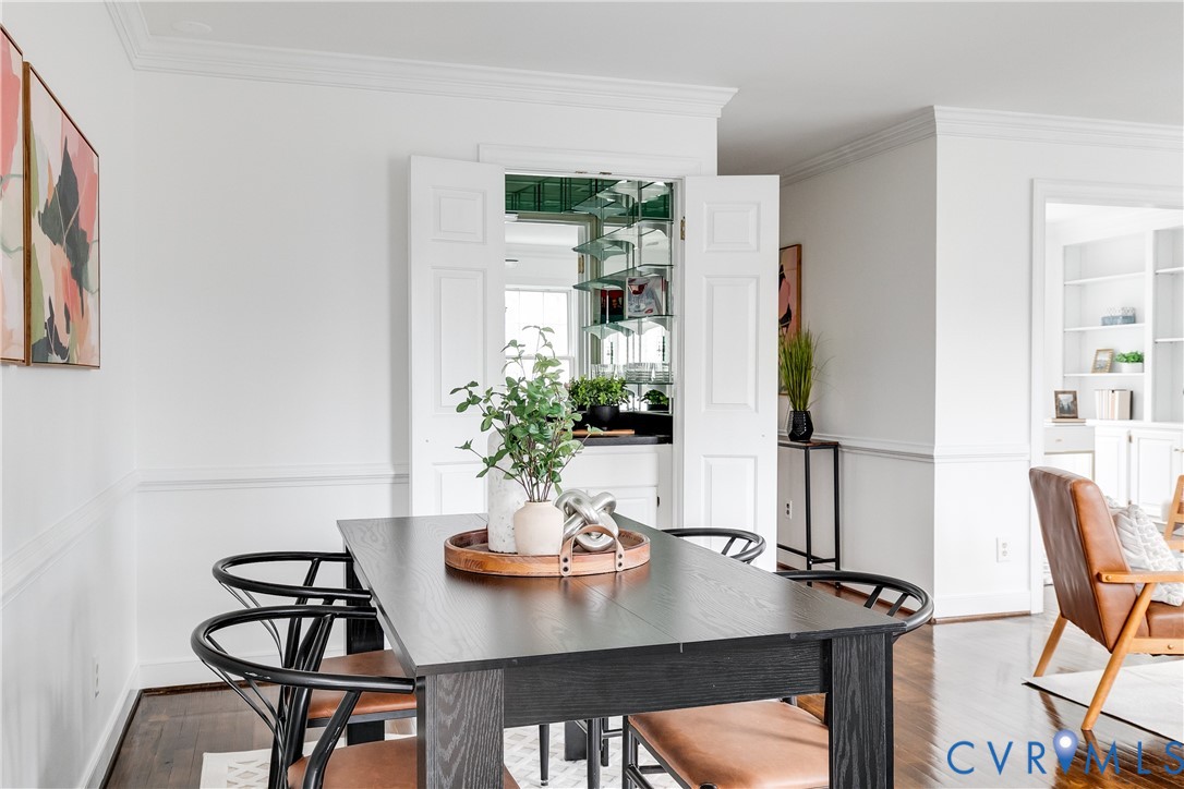 8902 Ginger Way Court Henrico, VA 23229 - Photo 11 of 34 a view of a dining room with furniture window and wooden floor