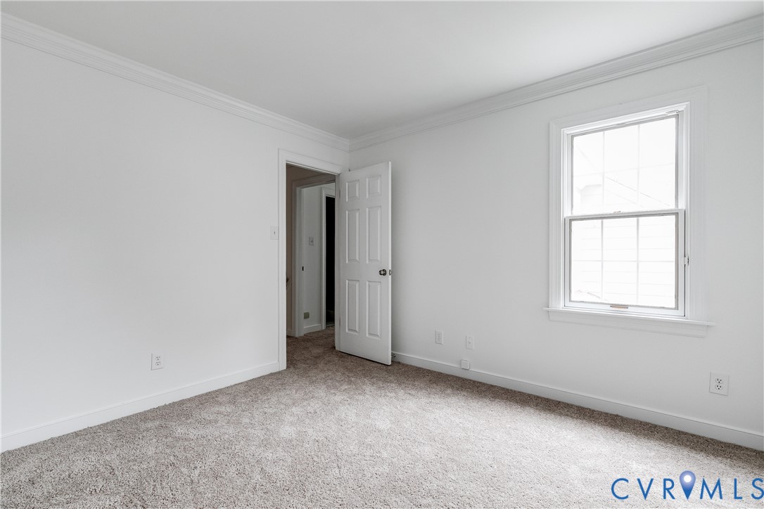 8902 Ginger Way Court Henrico, VA 23229 - Photo 27 of 34 an empty room with windows and closet