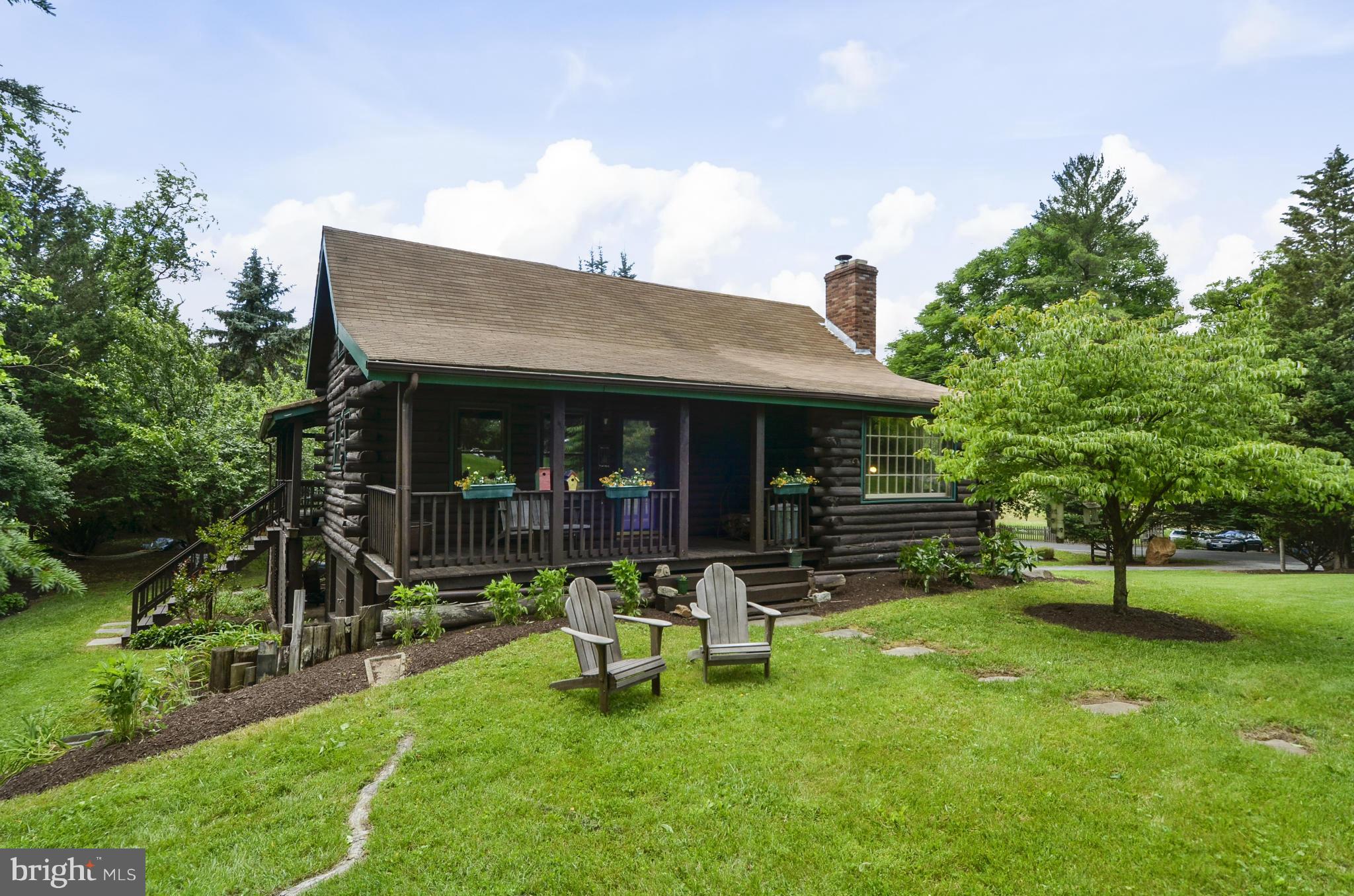 15500 Comus Road Clarksburg, MD 20871 - Photo 1 of 30 a view of a house with a yard porch and sitting area