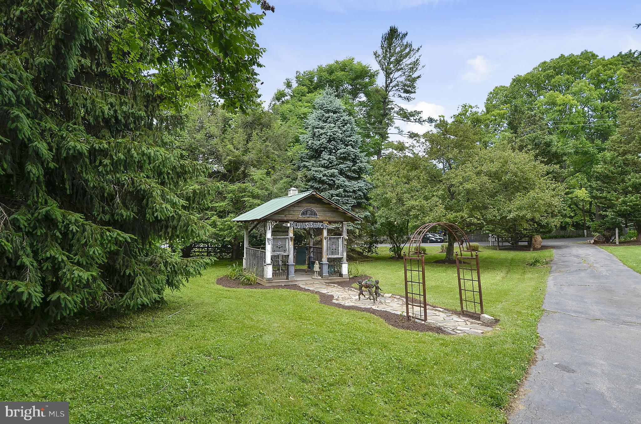 15500 Comus Road Clarksburg, MD 20871 - Photo 27 of 30 a view of a house with a backyard and a patio