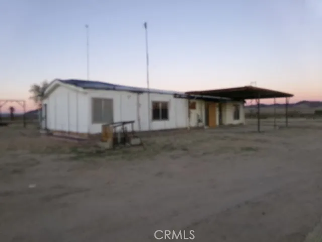 a house view with a outdoor space