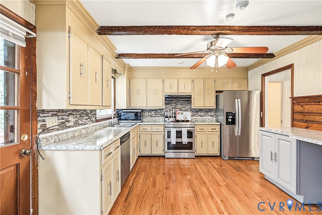 13310 Gladehill Road Chester, VA 23831 - Photo 6 of 41 Kitchen featuring wood-finish flooring, exposed ce