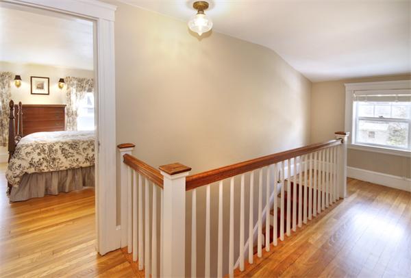 5 Marshall Road Winchester, MA 01890 - Photo 13 of 22 a view of hallway with wooden floor