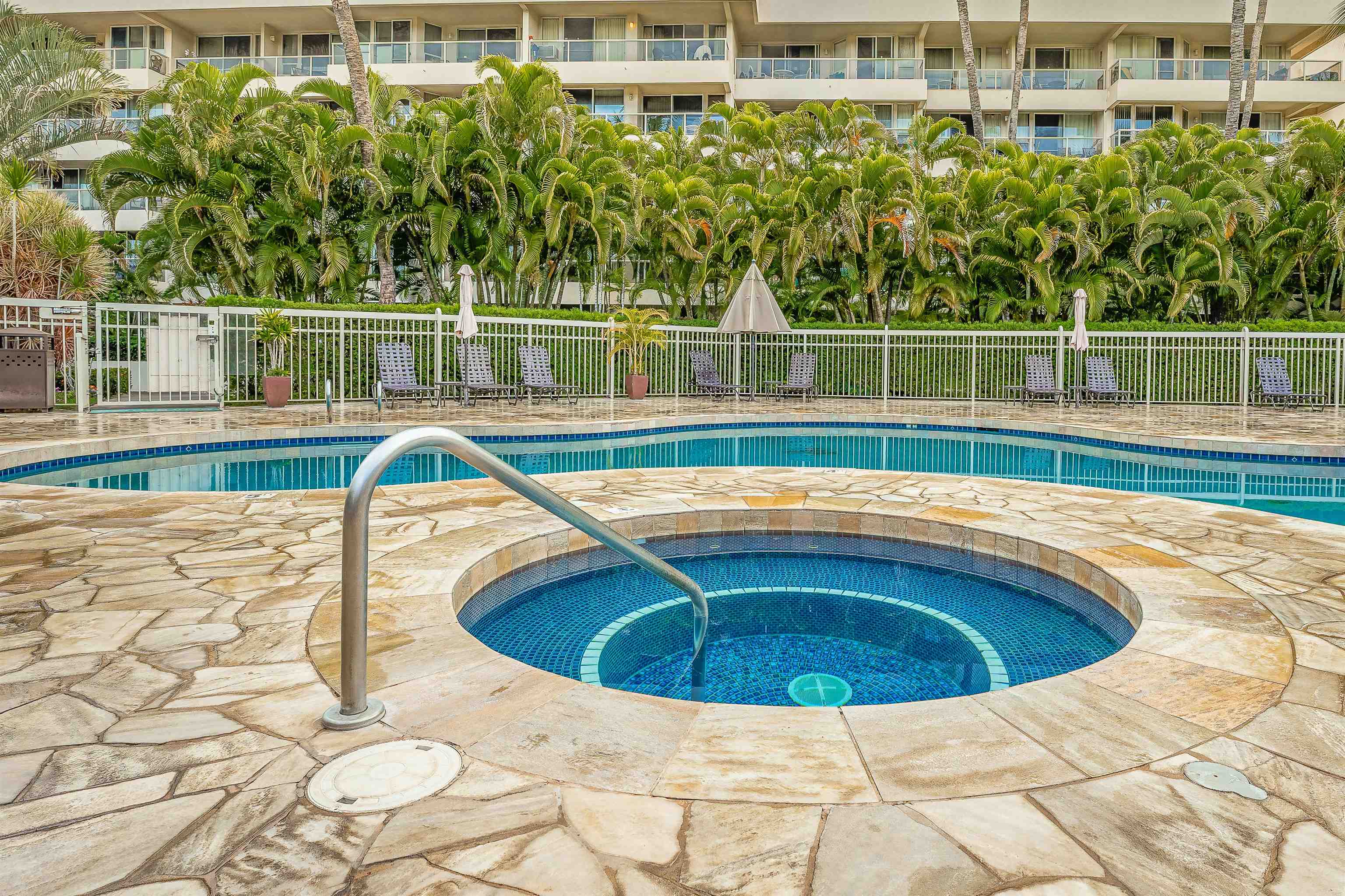 2575 South Kihei Road, Unit T110 Kihei, HI 96753 - Photo 19 of 24 a view of a swimming pool with a lake view